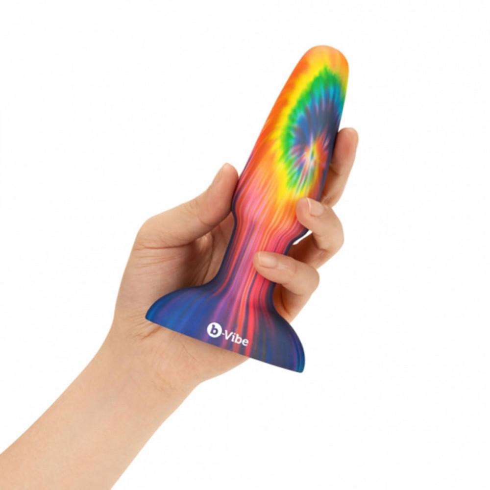 B-Vibe Peace & Love Tie Dye Rimming Plug in Hand